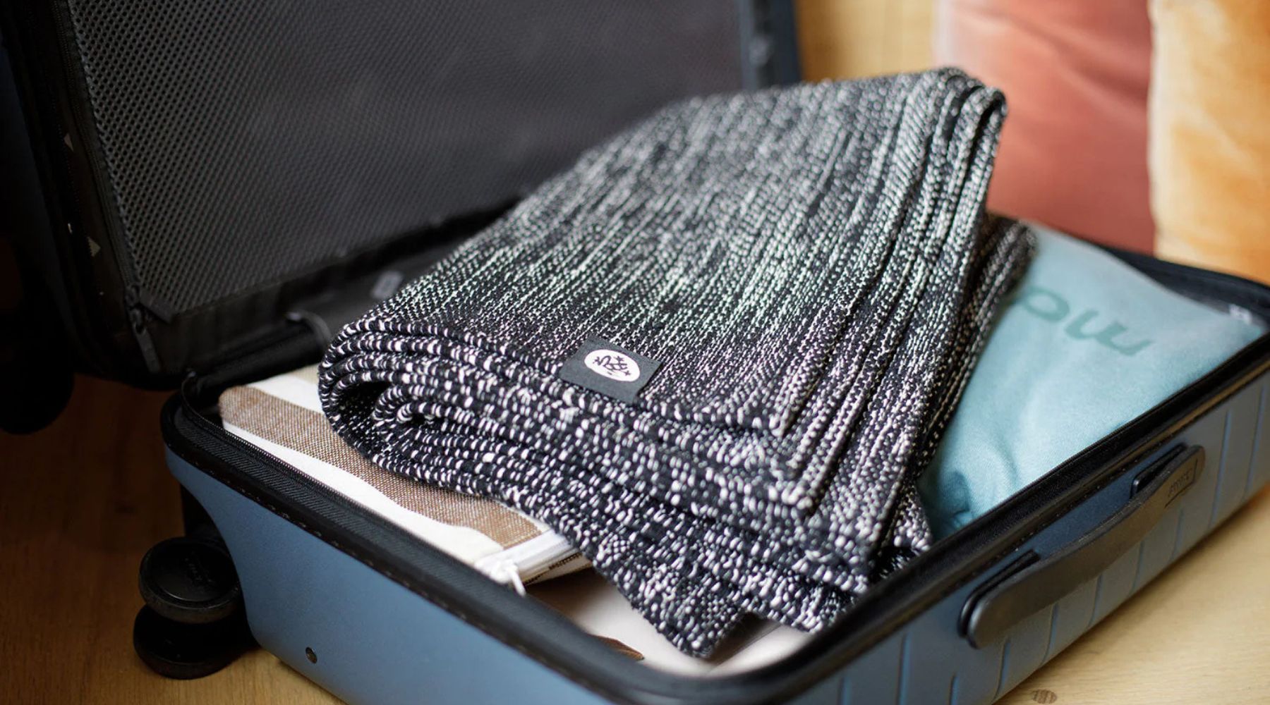 The Best Way to Pack Your Yoga Mat for Travel – Manduka